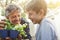 Sharing his passion for plants with his grandson. a grandfather teaching his grandson about gardening.