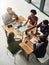 Sharing information for a successful collaboration. High angle shot of a group of colleagues having a meeting in a