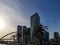 Sharjah city towers, bridge, street at sunset