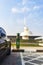 Sharjah, UAE - 09.07.2021 - Electrical vehicle at the charging station in the front of House of Wisdom library. Concept