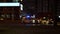 Sharjah, UAE - May 10, 2018: blue and red light flashing on top police car in night Sharjah city UAE. City cars moving