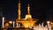 Sharjah, UAE - May 10, 2018: night fountain and Al Taqwa Mosque with beautiful backlight in in Sharjah city in United