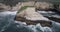 Shark Fin Cove Beach with a Towering rock and Sea Cave. California. Pacific  Ocean Waves. Island. Drone 6