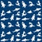 Sharks silhouettes seamless pattern. white on blue