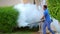 SHARM EL SHEIKH, EGYPT - APRIL 5, 2018 : Hotel Jaz Belvedere. Man work fogging to eliminate mosquitos with a special