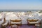 Sharm El Sheikh, Egypt - March 07, 2020: Top view of the resort town without tourists. Empty sofas sit on the roof of a five-star