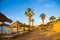 SHARM EL SHEIKH, EGYPT - March 18, 2019: Red Sea Coast, Concord Hotel. Beach with umbrellas, sun beds and palm trees. Background