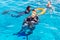 Sharm El Sheikh, Egypt May 08, 2019: Scuba divers dive into the clear blue water in the sea