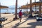 Sharm El Sheikh, Egypt May 10, 2019: A man with a camera walking along the sea beach