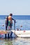 Sharm El Sheikh, Egypt May 10, 2019: scuba diver in wetsuit is preparing to dive