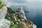 Sharp cliffs hang over the ocean, Dramatic marine background