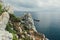 Sharp cliffs hang over the ocean, Dramatic marine background