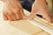 Sharp focus on skilled, determined woodworker\\\'s work