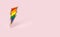 Sharp LGBT lightning bolt rainbow pride symbol isolated on pastel pink background with copy space on the right side. Homosexual