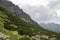 Sharp rocky mountains covered with clouds in High Tatras, Slovakia