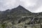 Sharp rocky mountains covered with clouds in High Tatras, Slovakia