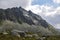 Sharp rocky peaks of mountain ranges under cloudy sky in the High Tatras, Slovakia