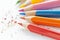 Sharpened colorful pencils and wood shavings, closeup