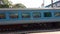 Shatabdi Express -12041  Howrah Junction to New Jalpaiguri  High speed Indian train running on railroad track in a Suburban