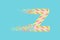 Shattering letter Z 3D realistic raster illustration. Alphabet letter with marshmallow texture. design element.