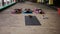 The shavasana. Women laying on mat in relaxing pose on the floor, front view, yoga class