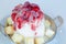 Shaved ice strawberry sauce and toast