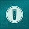 Shaver hairclipper icon on a green background, with arrows in different directions. It appears on the electronic board.