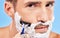 Shaving face, hair removal and man with razor in grooming and hygiene portrait, cream on beard to clean and beauty with