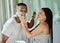 Shaving, playful and fun with a black couple laughing or joking together in the bathroom of their home. Love, shave and