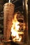 Shawarma is prepared on fire from firewood. Street food restaurant