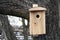 Shed for birds on trees. Wooden birdhouse on the tree