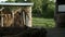 Shed of hay and wooden well on summer day view