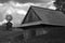 Shed with an iron windmill black and white