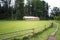 Shed storage on the fenced pasture.