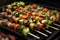 Sheekh kabab and variety of grilled legumes, skewers on bbq with a variety of marinades, outdoor picnic party