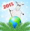 Sheep with a banner 2015 year and planet Earth