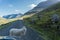 A sheep blocks the road without worrying