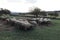 Sheep eating lambing lick pellets from metal steel food tables