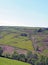 Sheep in fields and old abandoned farm houses surrounded by stone walls in the lumb valley in calderdale west yorkshire