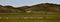 Sheep and goats on a pasture in Mongolia. Panorama of the pasture. Source of meat, milk and wool. Goat cashmere and cheese are a