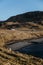 Sheep grazing on a cliff by the water on Isle of Skye, Scotland.