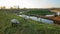 Sheep grazing on a meadow overlooking the fortified walls surrounding Veere, Zeeland, Netherlands