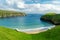 Sheep grazing near Silver Strand, a sandy beach in a sheltered, horseshoe-shaped bay, situated at Malin Beg, near Glencolmcille,