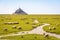 Sheep grazing on the salt meadows close to the Mont Saint-Michel tidal island in Normandy, France
