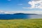 Sheep Island and Sanda Island on a Summer day from Southend near the Mull of Kintyre Argyll Scotland with copy space