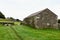 Sheep Pasture, Stone Walls and Barn near Sedbusk, Hawes, North Yorkshire, England, UK