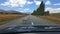 Sheep sleeps right on the middle of New Zealand highway.