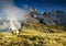 Sheep under three peaks Aiguilles d\'Arves in French Alps, France.