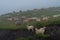 Sheeps on a mountain pasture on a foggy day. Georgia