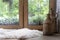 Sheepskin rug and home decor on wooden windowsill